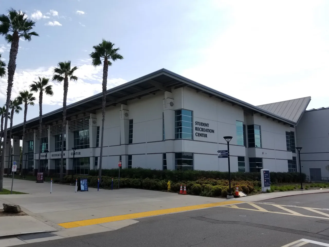 Student Recreation Center and palm-lined paths at California State University, Fullerton.