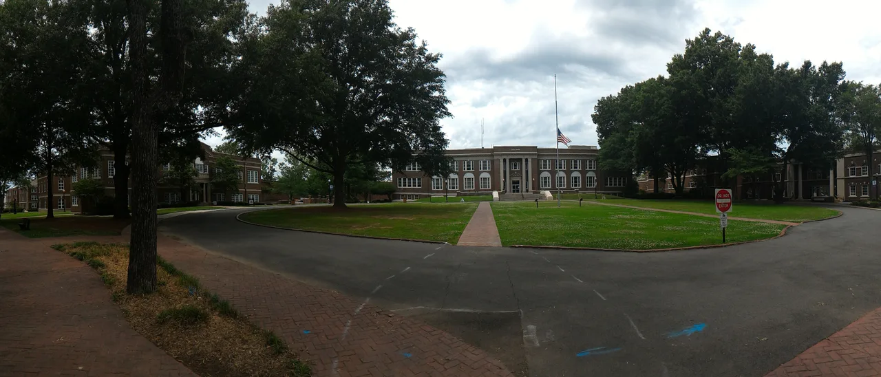 Old Main and tree-lined lawns at the University of Central Arkansas.