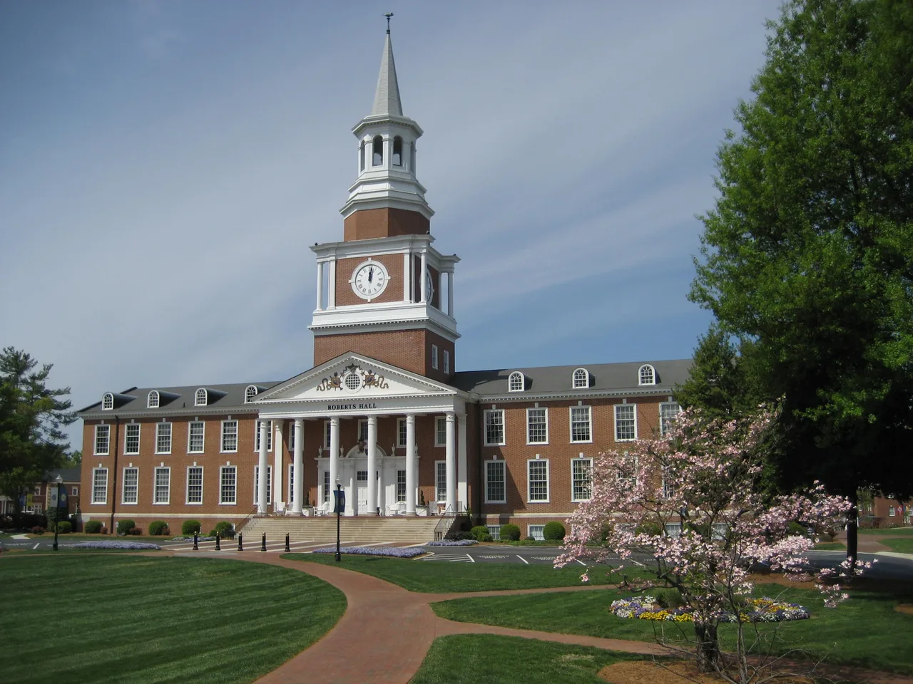 Roberts Hall with its white portico and clock tower at High Point University.
