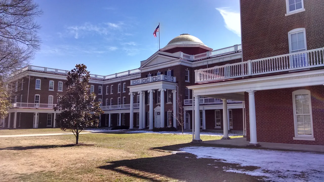 The brick facade, white columns and central dome of Ruffner Hall at Longwood University in Farmville, Virginia.